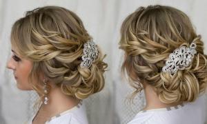 High hairstyle for wedding with flower